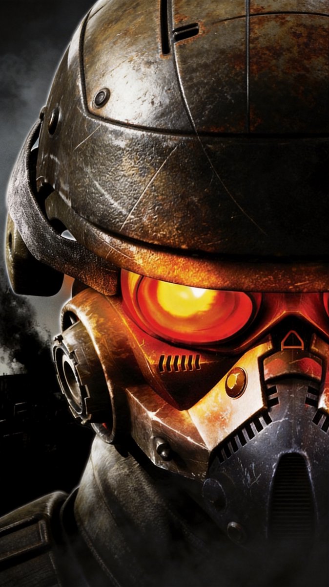 A Killzone box-art style close-up of a Helghast helmet with orange goggles in bronze tones against smoke