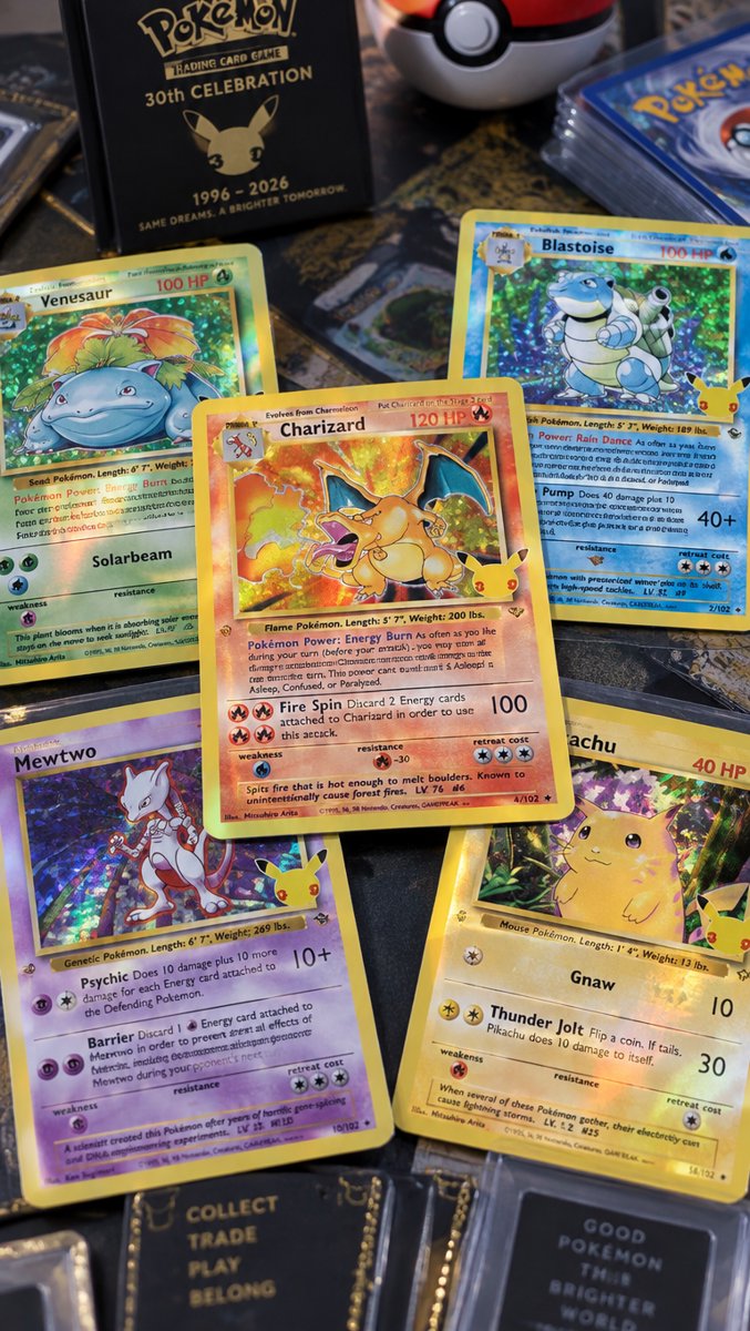 The 30th Celebration card lineup, holographic foil catching the light