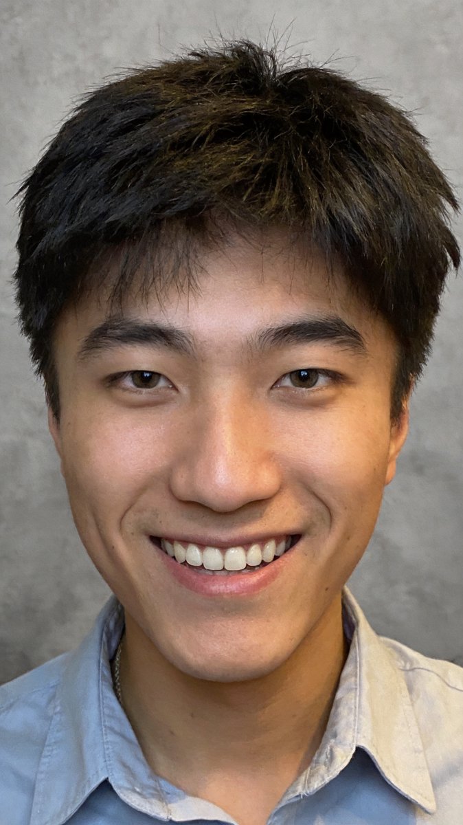 Portrait of a young man with a confident smile — the user every AI platform is fighting over