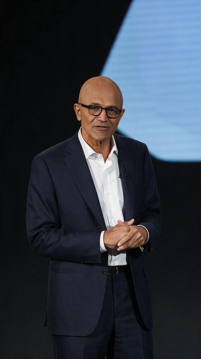 Satya Nadella on a Microsoft keynote stage