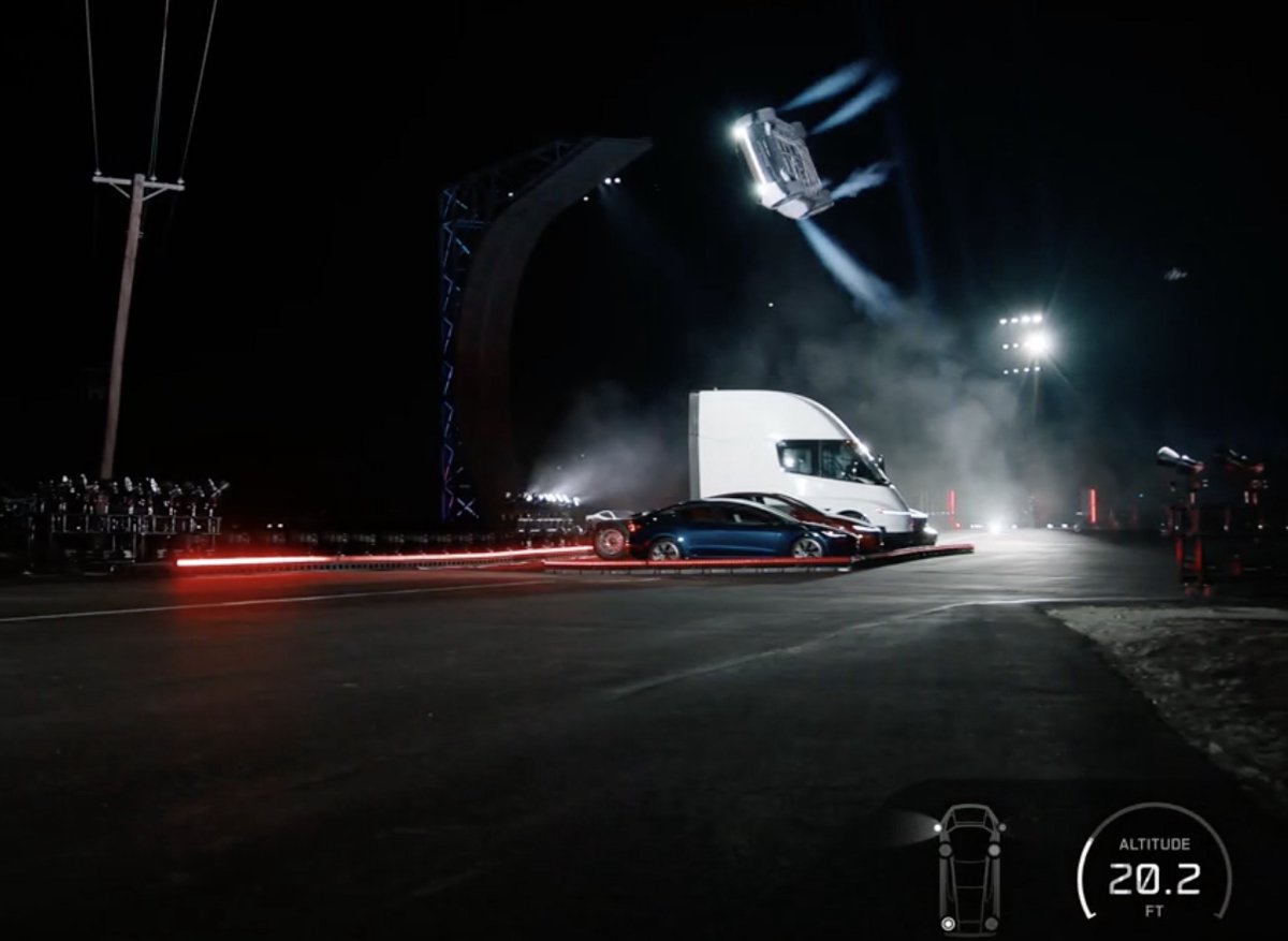 The Roadster in flight over other Tesla vehicles during the reveal demonstration